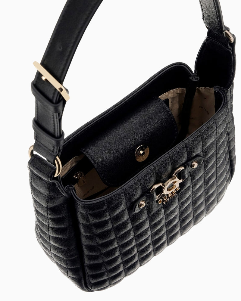 Interior of Guess Nadira bag with logo lining and zip compartments