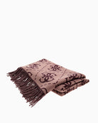 Detail of Guess 4G print on lightweight patterned scarf