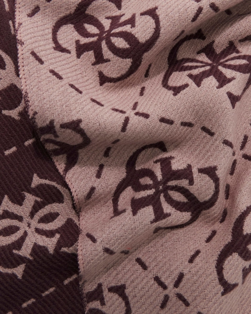 Close-up of fringed hem on multicolour Guess scarf