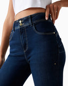 Close-up of Guess two-button waistband on stretch denim jeans