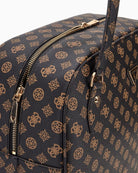 Close-up of faux leather texture and Guess gold hardware detailing