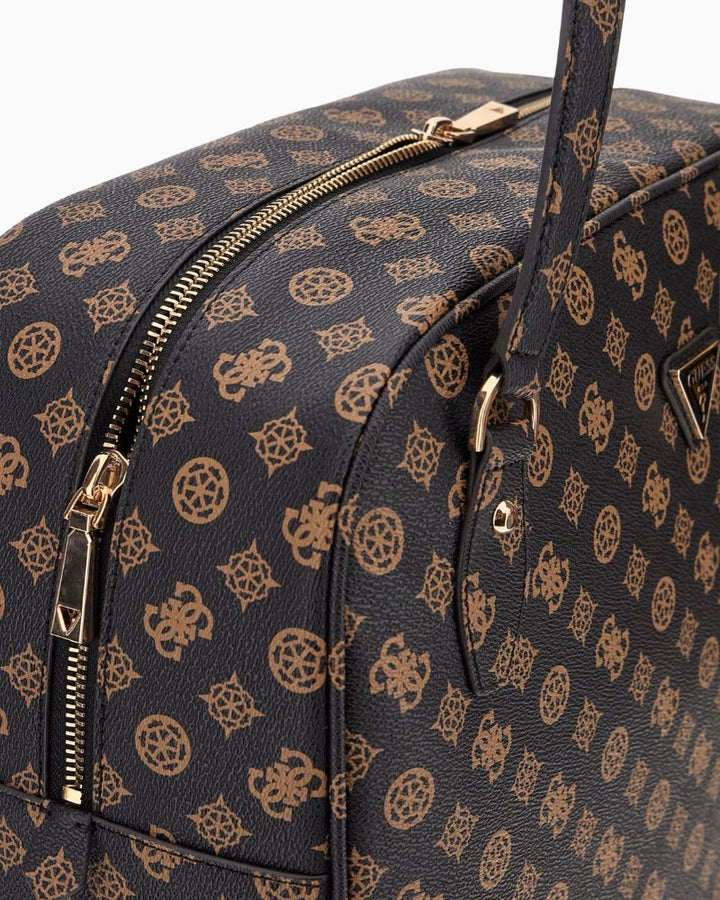 Close-up of faux leather texture and Guess gold hardware detailing