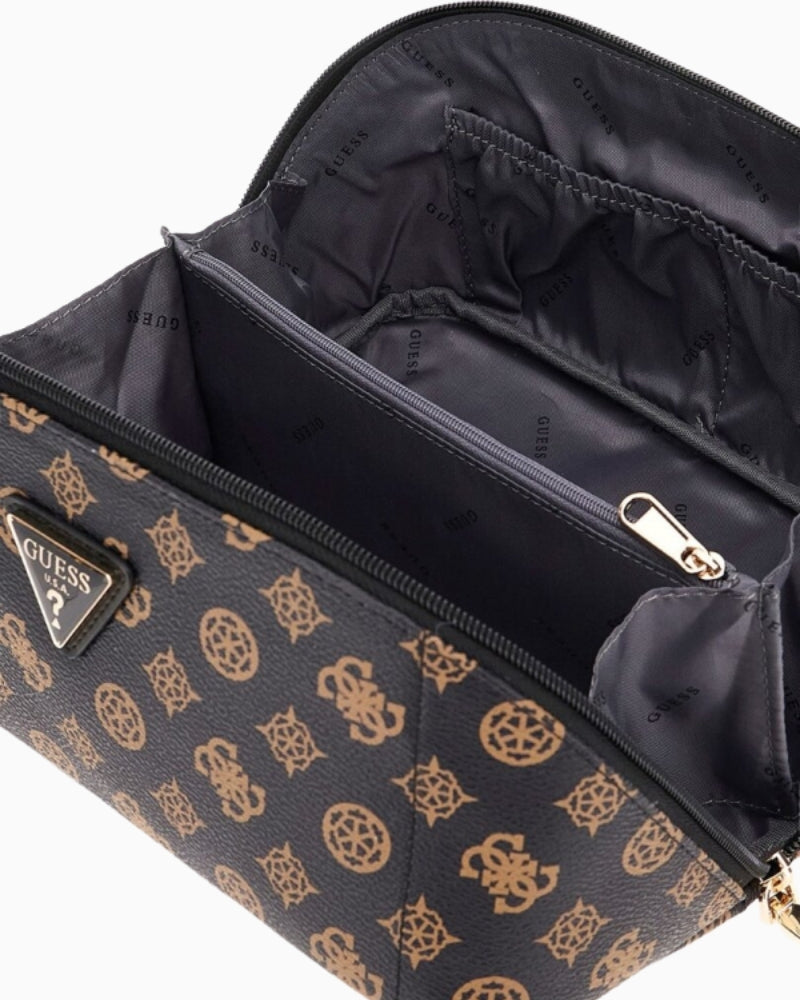 Interior of GUESS cosmetic bag with roomy compartment and slip pocket