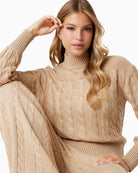 Close-up of mock neck and cable detail on women’s wool-blend sweater