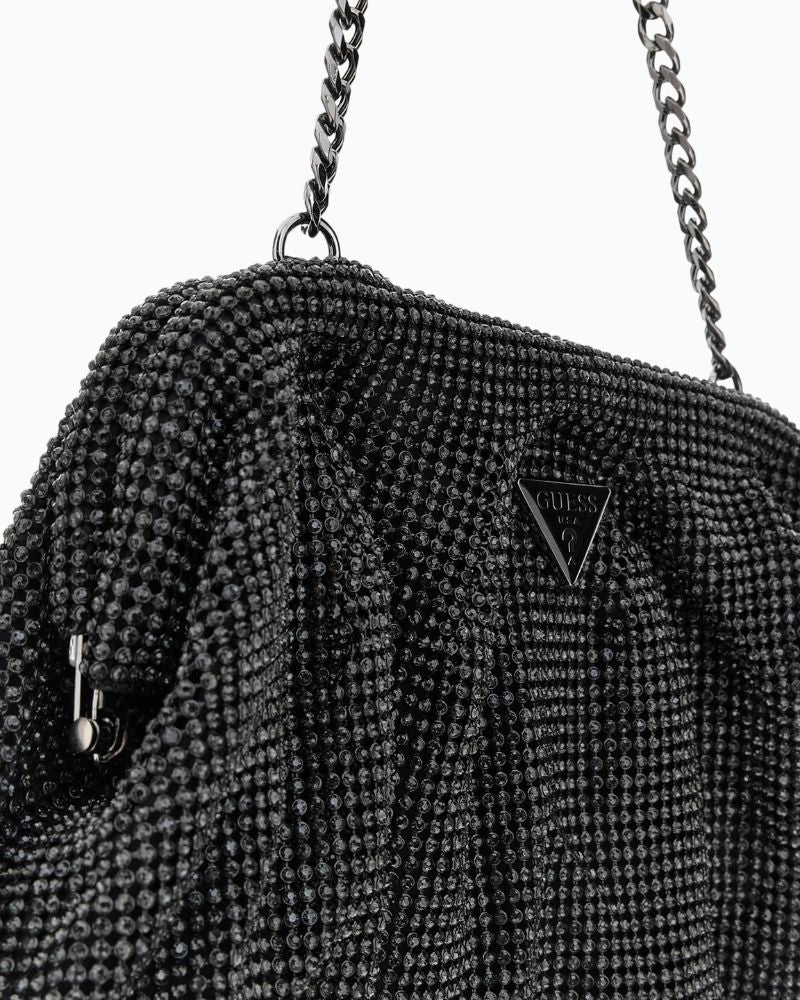 Close-up of rhinestone mesh texture and silver hardware detail