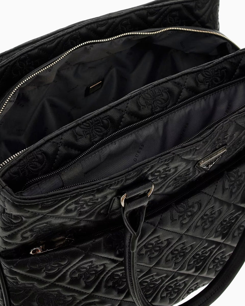 Interior of Adelasia tote with logo lining and multiple zip pockets