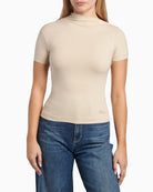 Guess Damiana asymmetric top beige full front view