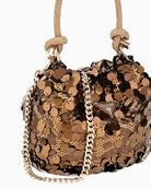 Side view of Guess bronze mini bag with detachable chain strap