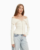 Front view of cream slim fit zipped cardigan by Guess with ribbed knit and pastel detailing