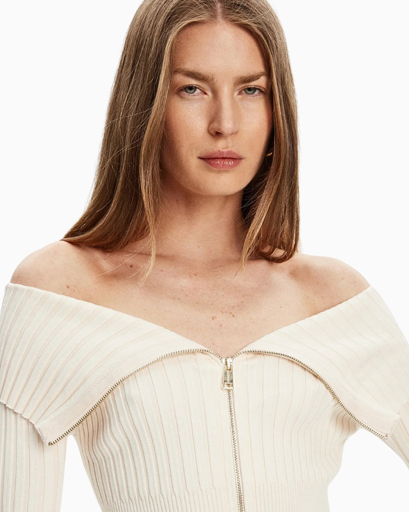 Close-up of front zip and fine knit detail on cream viscose blend cardigan by Guess