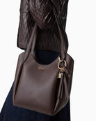 Guess Melody Bucket Bag in brown with shoulder strap