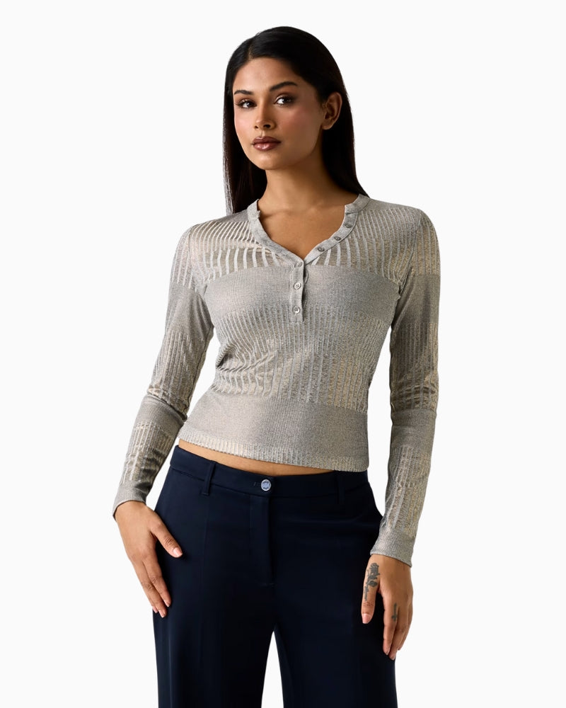 woman wearing Guess metallic effect knit top silver front view – Áaines Boutique