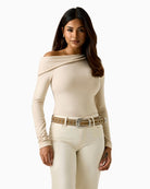 woman wearing Guess one-shoulder top beige front view – Áines Boutique