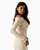 Guess one-shoulder top beige side view – Áines Boutique