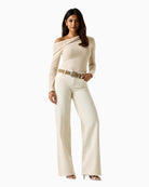 Guess one-shoulder top beige paired with trousers – Áines Boutique