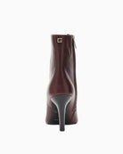 Guess Raffa Boots in burgundy patent leather back view