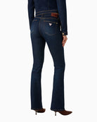 Guess Sexy Flare Jeans in Dark Denim back view