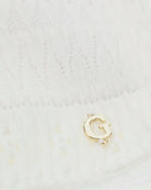 Guess Square Neck Smocked Top in White flat lay logo detail