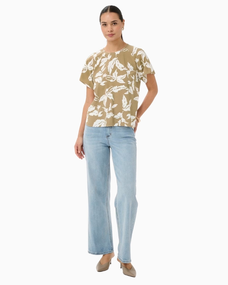 Woman wearing Kaffe Marlo leaf print blouse – Áines Boutique