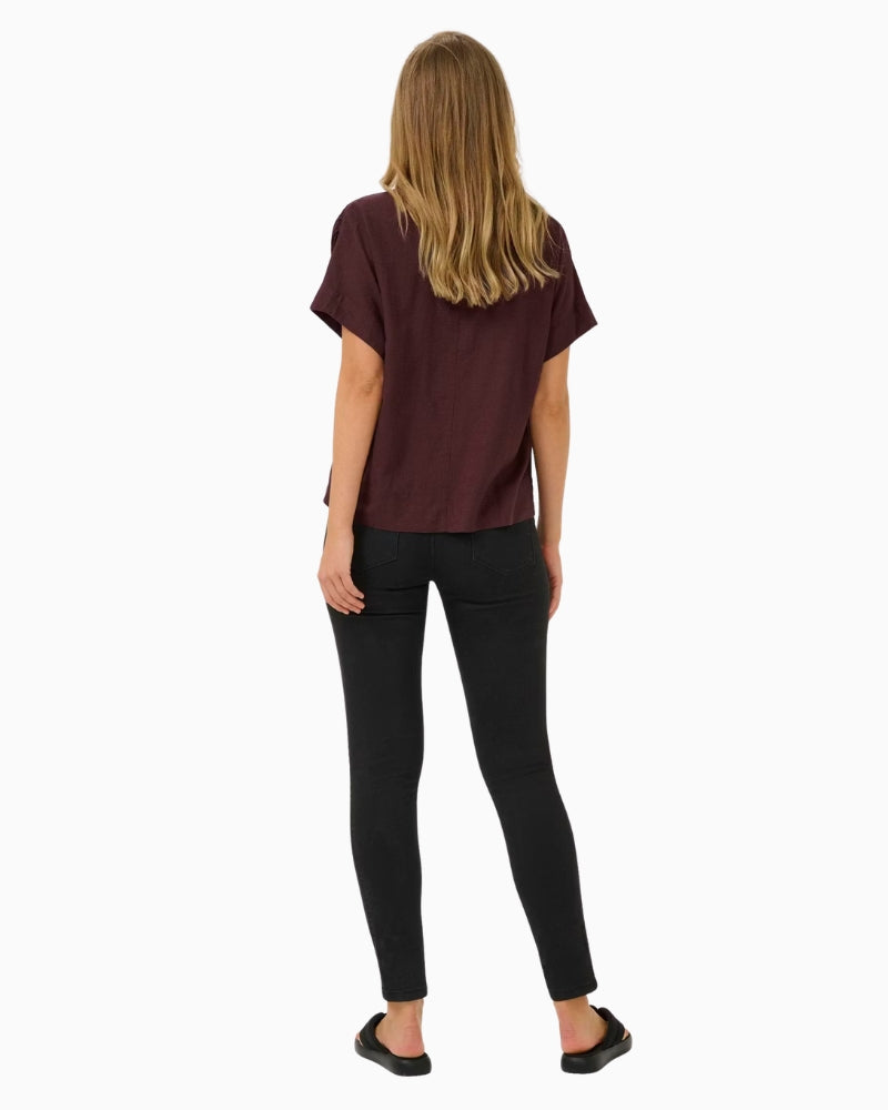 Woman wearing Kaffe Kamilia Linen Top Natural back view – Áines Boutique