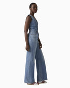 Levi’s denim wide-leg jumpsuit, side view highlighting leg width – Áines Boutique