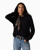 Woman styling Levi’s satin bandana around neck – Áines Boutique