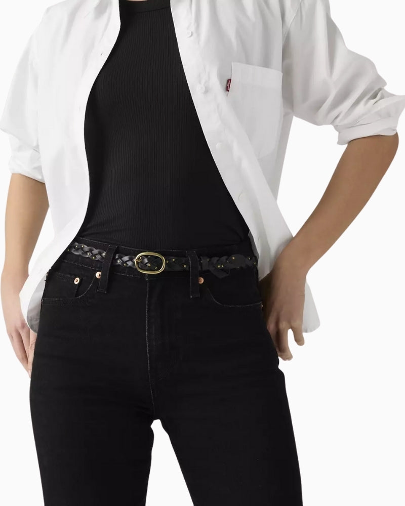 Woman wearing Levi’s Taylor black braided belt styled with denim – Áines Boutique