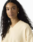 Levi's Vintage V-neck Sweatshirt cream angled front view