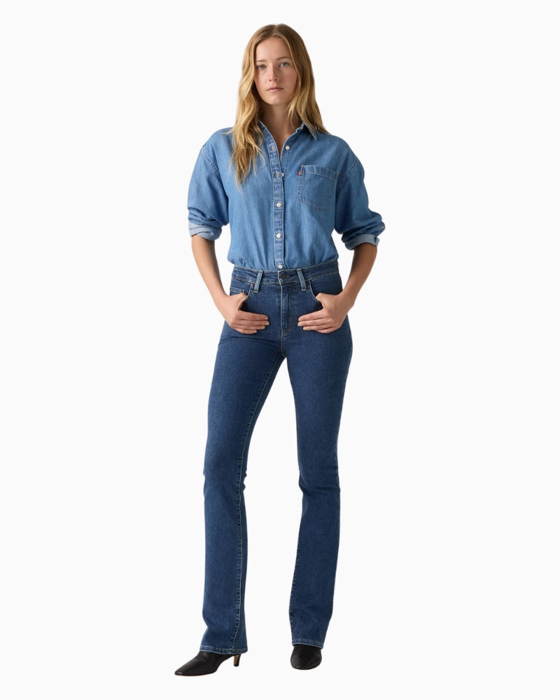 Front view of Levi’s 725 high-rise bootcut jeans in soft stretch denim with slim fit