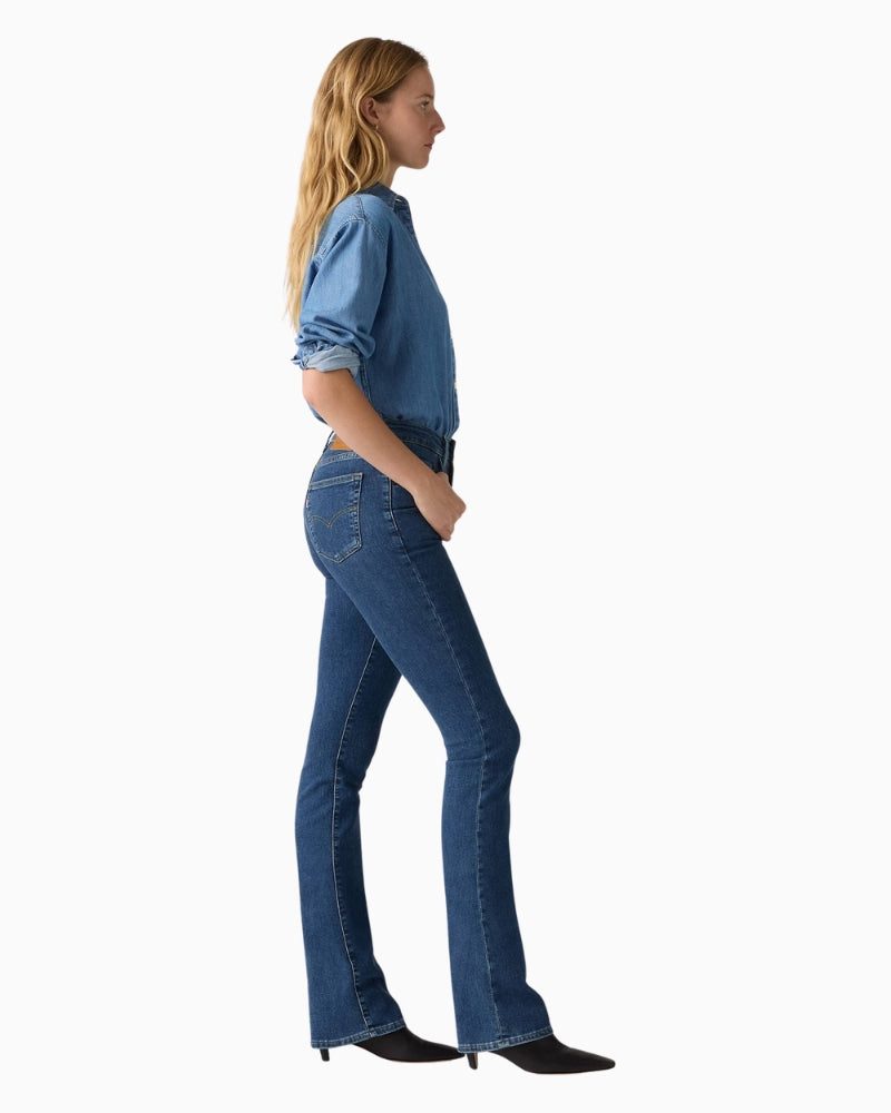 Side angle showing flattering shape and modern bootcut hem on Levi’s 725 jeans