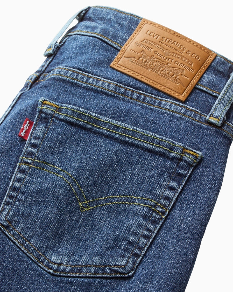Close-up of Levi’s Stellar Stretch fabric with zip fly and clean finish