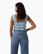 Back of  Levi’s Amaya cropped blouse in light blue chambray with ruching
