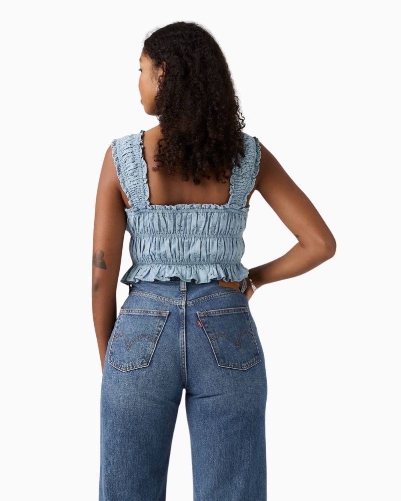 Back of  Levi’s Amaya cropped blouse in light blue chambray with ruching