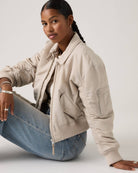 Levi’s Bowie Cropped Bomber Jacket woman wearing jacket side view – Áines Boutique