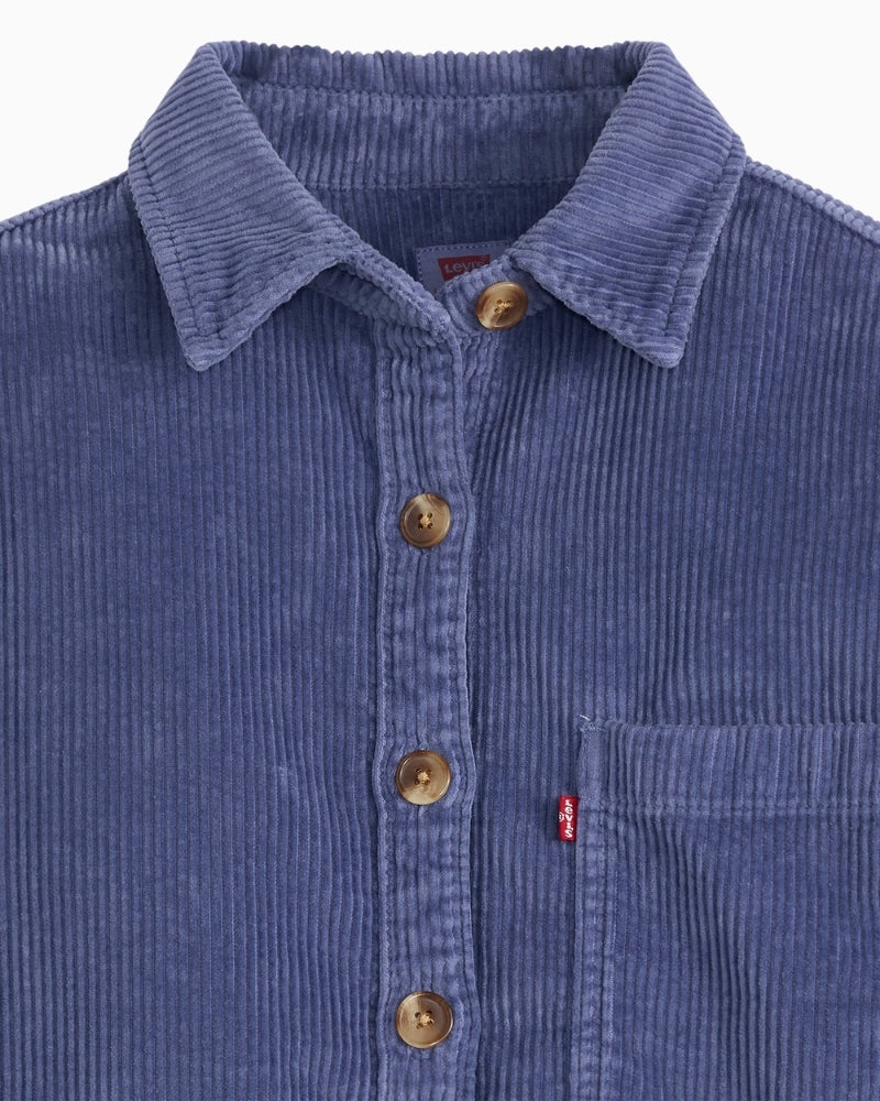 Close-up of corduroy fabric and button fastening on Levi’s Celine Cozy Shacket