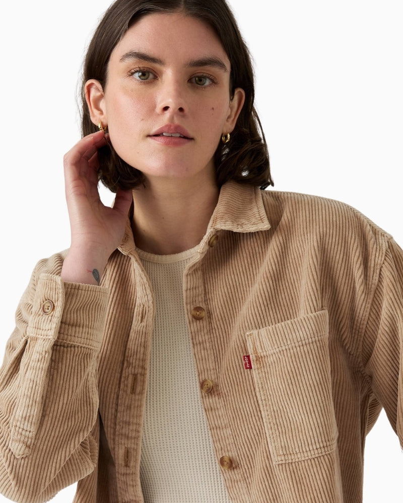 Close-up of corduroy texture and button fastening on Levi’s shacket