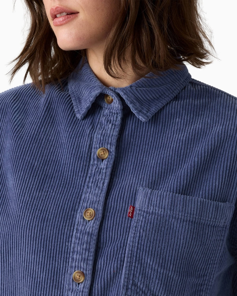 Close-up of corduroy fabric and button fastening on Levi’s Celine Cozy Shacket