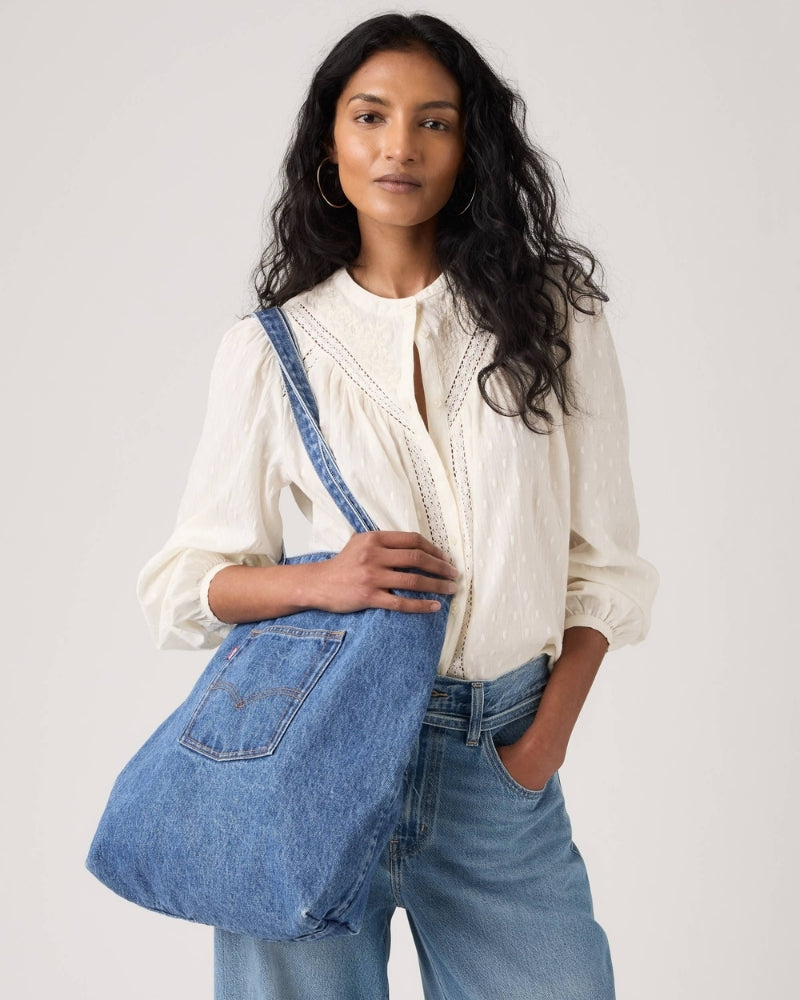 Levi’s Denim Tote Bag worn over shoulder – Áines Boutique