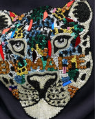 Close-up of rhinestone accents on Lola Casademunt cotton top