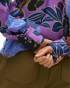 Close-up of lightweight viscose fabric and colourful floral pattern