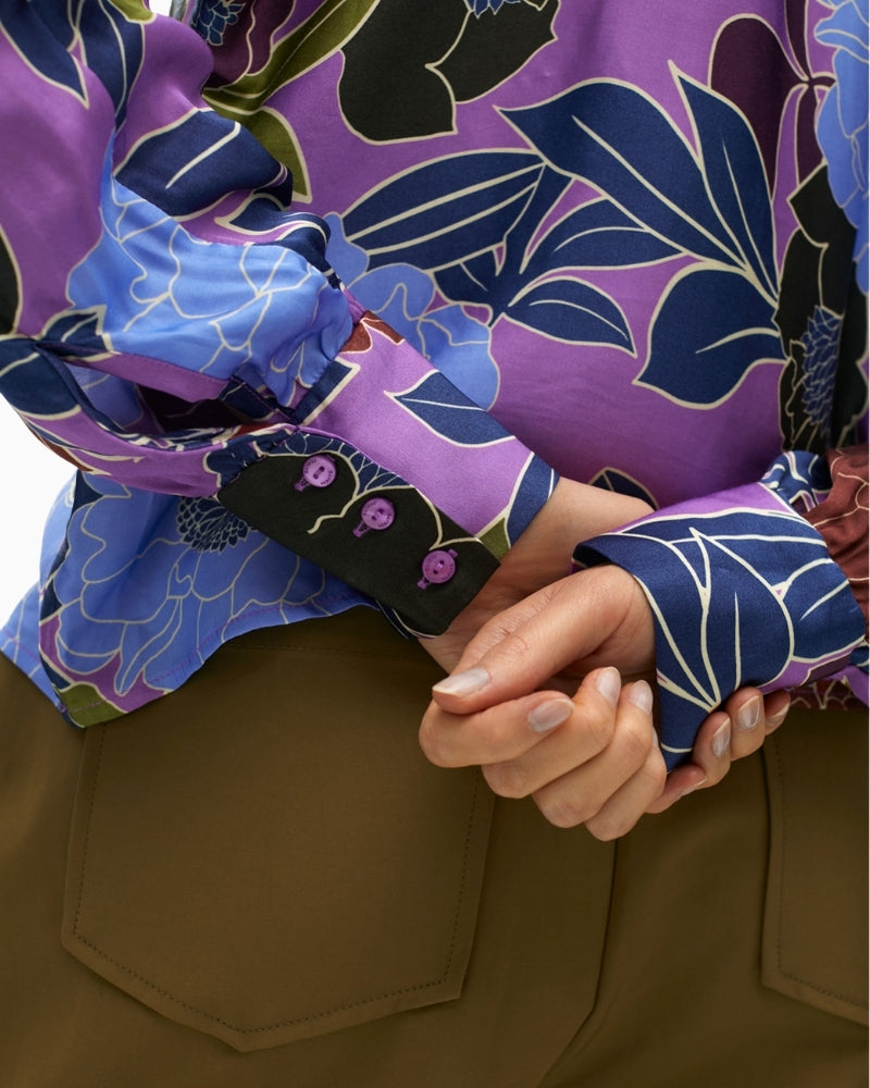 Close-up of lightweight viscose fabric and colourful floral pattern