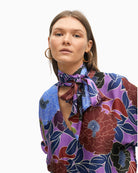Close-up of lightweight viscose fabric and colourful floral pattern