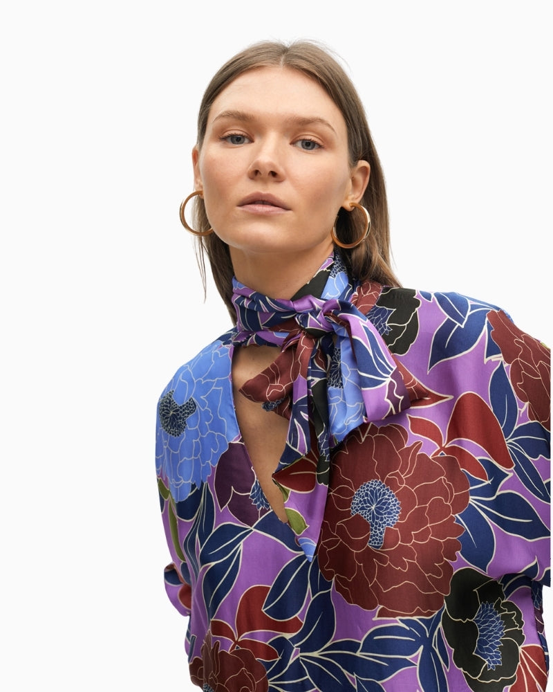 Close-up of lightweight viscose fabric and colourful floral pattern