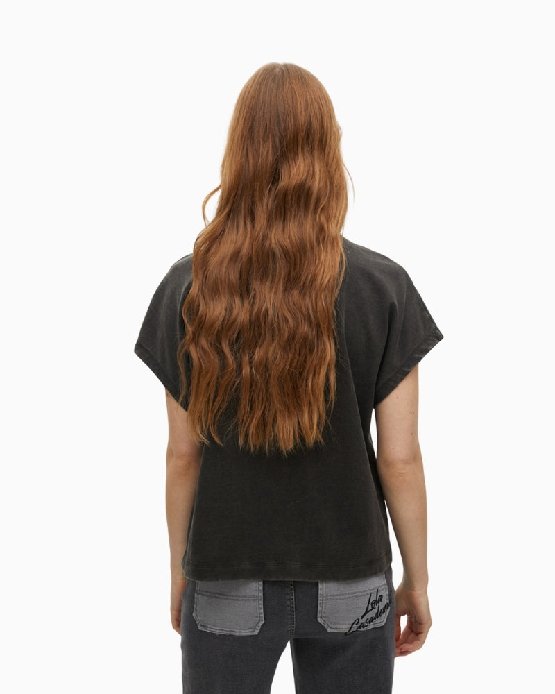 Back view showing relaxed fit and short sleeves