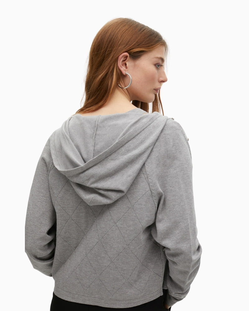Back view of Lola Casademunt gilet showing hood and soft knit texture