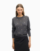 Soft knit jumper by Lola Casademunt with gold embellishments and round neckline