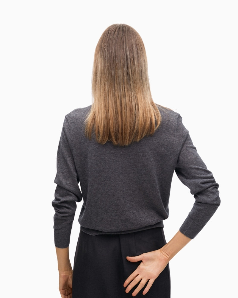 Back of Soft knit jumper by Lola Casademunt with gold embellishments and round neckline