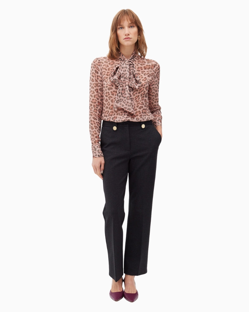 Front view of elegant pull-on trousers styled with blouse