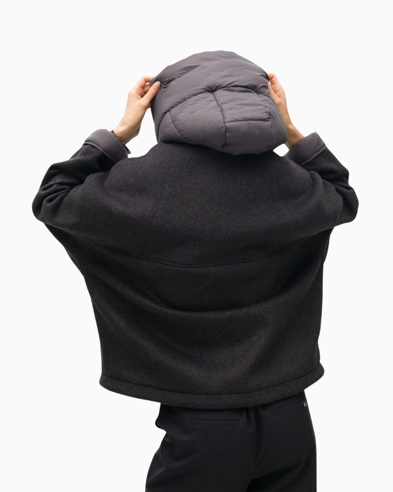 Back of Short overcoat by Lola Casademunt with wool-blend fabric and structured shape