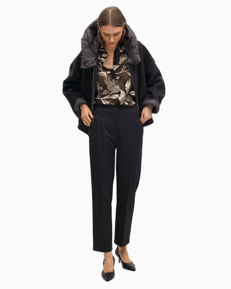 Short overcoat by Lola Casademunt with wool-blend fabric and structured shape